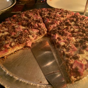 Satchel's Pizza - Gluten-free flaxseed pizza with ground beef and ham - Pizza Near Me - Gainesville, Florida