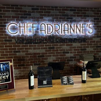 Chef Adrianne's Vineyard Restaurant and Bar - The hostess stand when you enter - Steakhouses Near Me - Miami, Florida Chef Adrianne's Vineyard Restaurant and Bar - The hostess stand when you enter - Steakhouses Near Me - Miami, Florida