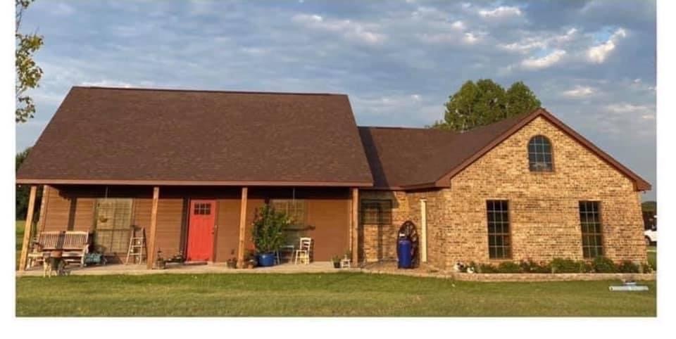 Slide of Knowles Roofing