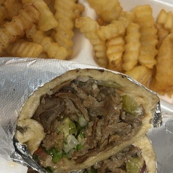 LaShish Greek & Mediterranean - Gyro plates I added the Lebanese pickles on just because that's what I'm used to. This was also amazing. - Mediterranean Near Me - Allen, Texas