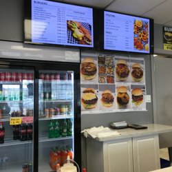 Burger St - Behind the counter at Burger St. 4218 Lawrence Ave East, Scarborough Ont. Also, Thai St. at same location. Review to follow.