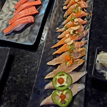 Catch and Fire - Crab, garlic salmon, Cajun albacore, and jalepeno yellowtail nigiri - Japanese Near Me - Las Vegas, Nevada Catch and Fire - Crab, garlic salmon, Cajun albacore, and jalepeno yellowtail nigiri - Japanese Near Me - Las Vegas, Nevada