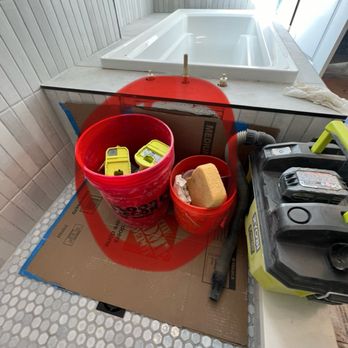 Renovate Me - The hole they had to cut in brand new shower wall to fix their mistake that they tried to cover up while working on it. - General Contractors Near Me