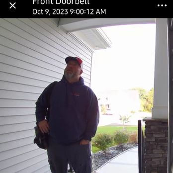 Delmarva Aire - Josh reading the sign on the door stating masks are required. - Heating & Air Conditioning/HVAC Near Me - Fredericksburg, Virginia
