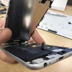 Charging Port - Bad battery in an iPhone 6 starting to get swollen. Started to push the screen out.