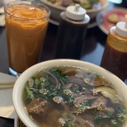 07A pho - pretty much has all the meats. Thai iced tea. 1P. Bun Bo Hue (background) 07A pho - pretty much has all the meats. Thai iced tea. 1P. Bun Bo Hue (background)