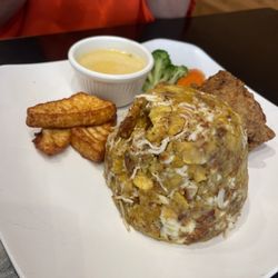 El Conuco Restaurante - Mofongo de chicharrón de pollo con queso frito / it was soooo good and stuffed with both - WoW