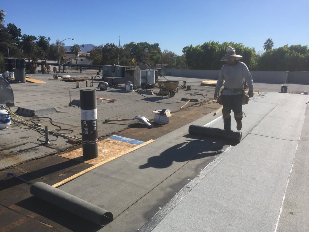 Slide of Armandos Roofing