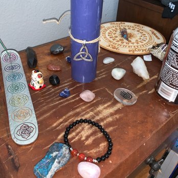 Lady of the Lake - Rainbow rose quartz, carnelian/ black onyx bracelet, peacock ore, & trinity charm with purple candle - Bookstores Near Me - Temecula, California Lady of the Lake - Rainbow rose quartz, carnelian/ black onyx bracelet, peacock ore, & trinity charm with purple candle - Bookstores Near Me - Temecula, California