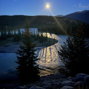Tekarra Lodge - The River at night - Hotels Near Me - Jasper, Alberta