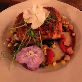 Turners - Maple infused salmon on a bed of fresh mixed summer veggies and kale. - New American Near Me - Leesburg, Florida Turners - Maple infused salmon on a bed of fresh mixed summer veggies and kale. - New American Near Me - Leesburg, Florida