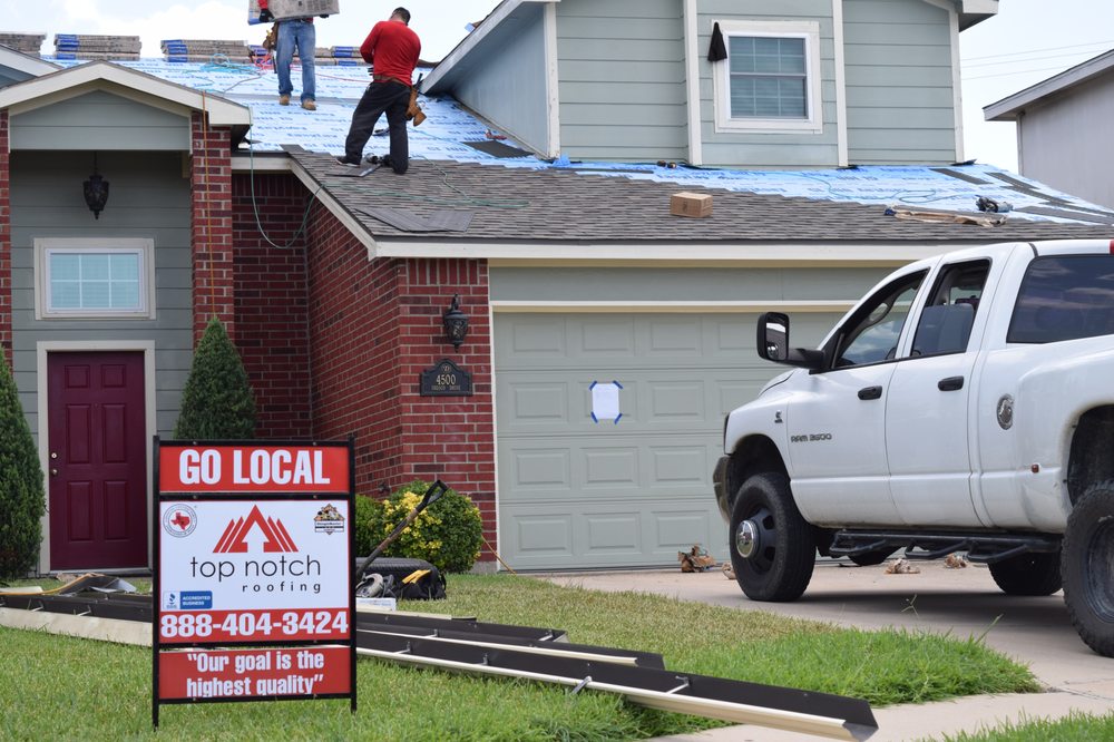 Slide of Top Notch Roofing