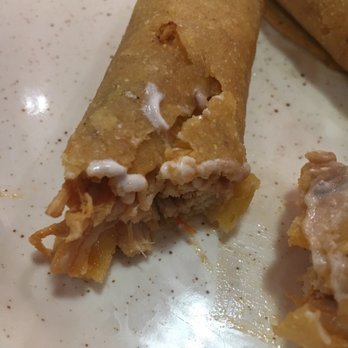 Los Toltecos Bar & Grill - Inside of my chicken flauta! Packed with chicken! Delicious. - Bars Near Me - Ashburn, Virginia Los Toltecos Bar & Grill - Inside of my chicken flauta! Packed with chicken! Delicious. - Bars Near Me - Ashburn, Virginia