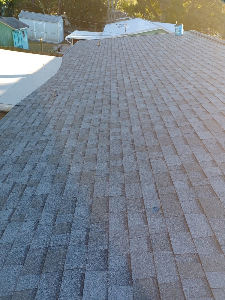 Slide of Dunedin Roofing