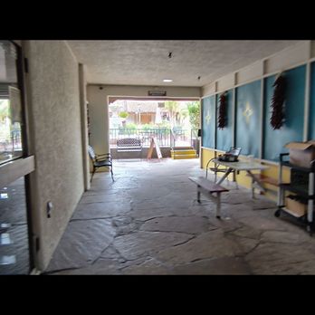 Poco & Moms - The dining room on the left is completely isolated from the main restaurant, separated by this wide hallway to the outside area. - American Near Me - Tucson, Arizona Poco & Moms - The dining room on the left is completely isolated from the main restaurant, separated by this wide hallway to the outside area. - American Near Me - Tucson, Arizona