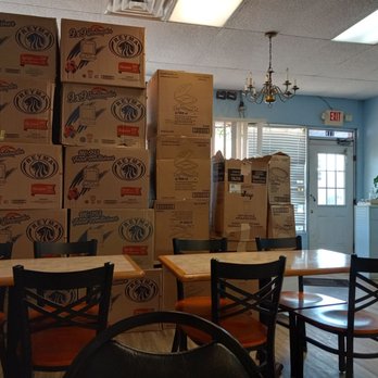 Hong Kong Buffet - a man standing in front of a wall of boxes - Buffets Near Me - Colquitt, Georgia