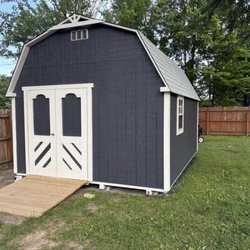 Storage Buildings Unlimited - I moved the door for my tractor and giving more room for my wife on her counter