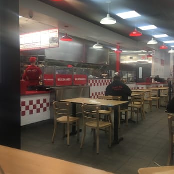 Five Guys - The dining room and open kitchen. - Burgers Near Me - Chelmsford, Massachusetts