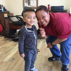 Levels Barbershop - My two year old obviously loves his barber April.