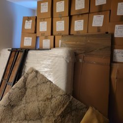 Puro Clean - Boxes, mostly empty, 4-6 books per box.