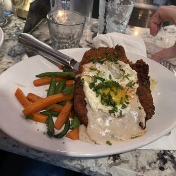 Granite House Lounge - Chicken fried steak with a fried egg - Southern Near Me - Fredericksburg, Texas Granite House Lounge - Chicken fried steak with a fried egg - Southern Near Me - Fredericksburg, Texas