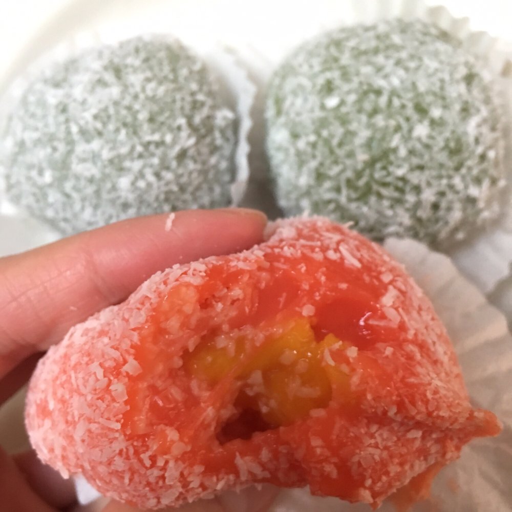 Sun Maxim's - Mango mochi w fresh mango pieces inside. Green tea in the back. - Bakeries Near Me - San Francisco, California
