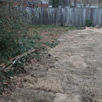 Solid As A Rock - a yard with a fence and no grass - Landscaping Near Me - Little Rock, Arkansas