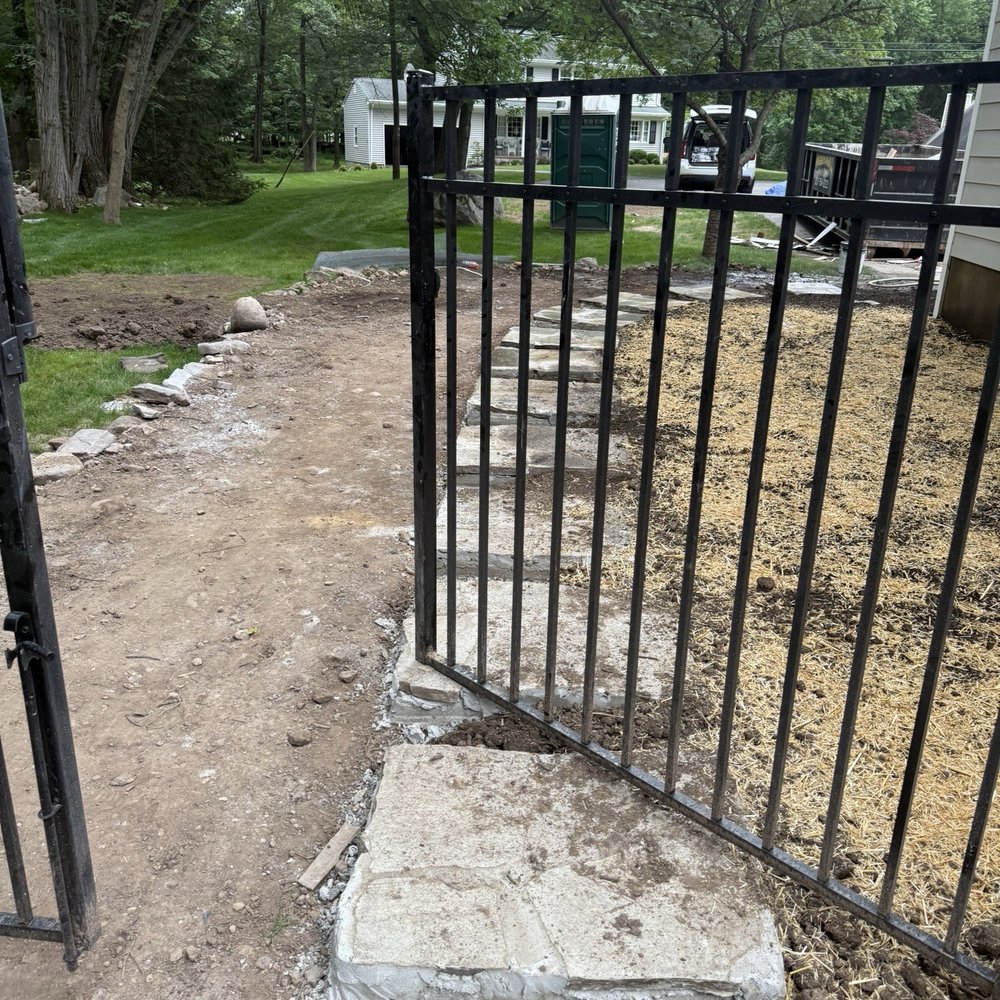 HQ Landscaping - The walkway is so high that I can't open the gate all the way. - Masonry/Concrete Near Me HQ Landscaping - The walkway is so high that I can't open the gate all the way. - Masonry/Concrete Near Me