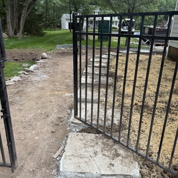 HQ Landscaping - The walkway is so high that I can't open the gate all the way. - Masonry/Concrete Near Me