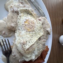 Cathy's Grill - full order: biscuits and gravy with two eggs over medium and a side of bacon