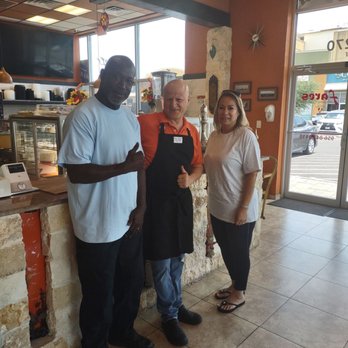 Fares Arabic Cuisine - My wife and I posing with the owner. Unfortunately, we didn't get his name. This guy was so cool. Great dinning experience. - Halal Near Me - McAllen, Texas