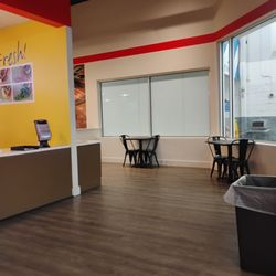 Walmart Supercenter - New flooring, new tables and Chairs.