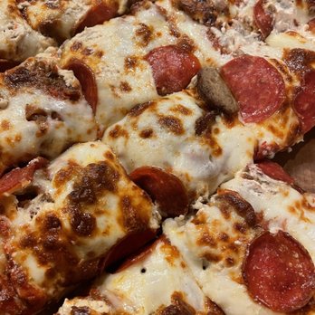 Vic's Pizza - Stamp Collector. Sausage, pepperoni and garlic cream cheese. - Pizza Near Me - Lincoln, Nebraska