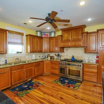 McCarley Construction - a kitchen with a ceiling fan - General Contractors Near Me McCarley Construction - a kitchen with a ceiling fan - General Contractors Near Me