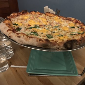Wild Tomato - The green and gold pizza! THOSE ARE CHEESE CURDS ON MY PIZZA! - Pizza Near Me - Fish Creek, Wisconsin Wild Tomato - The green and gold pizza! THOSE ARE CHEESE CURDS ON MY PIZZA! - Pizza Near Me - Fish Creek, Wisconsin