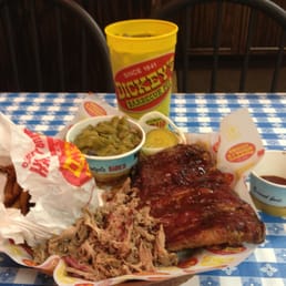 a plate of ribs and sides