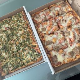 Garlic clam and sausage pizza - small double sliced Garlic clam and sausage pizza - small double sliced