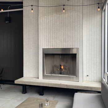 Antiques On High - Fireplace upstairs. - Cocktail Bars Near Me - Columbus, Ohio