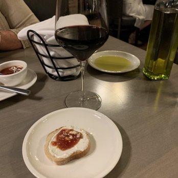 Torchio Pasta Bar - Whipped ricotta and tomato fig jam with crostini. - Italian Near Me - Chicago, Illinois Torchio Pasta Bar - Whipped ricotta and tomato fig jam with crostini. - Italian Near Me - Chicago, Illinois