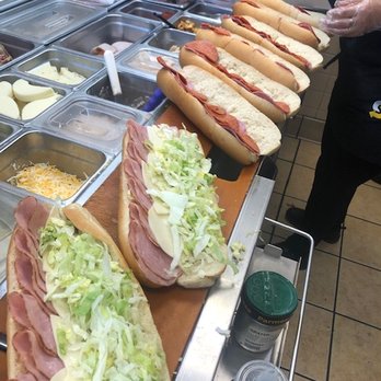 Subway - a line of hot dogs with various toppings - Sandwiches Near Me - La Quinta, California Subway - a line of hot dogs with various toppings - Sandwiches Near Me - La Quinta, California