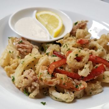 La Sen Bistro - Calamari Frits - Fried calamari with garlic, red bell peppers, white onions & lemon anchovy sauce ($12) - French Near Me - Walnut Creek, California La Sen Bistro - Calamari Frits - Fried calamari with garlic, red bell peppers, white onions & lemon anchovy sauce ($12) - French Near Me - Walnut Creek, California