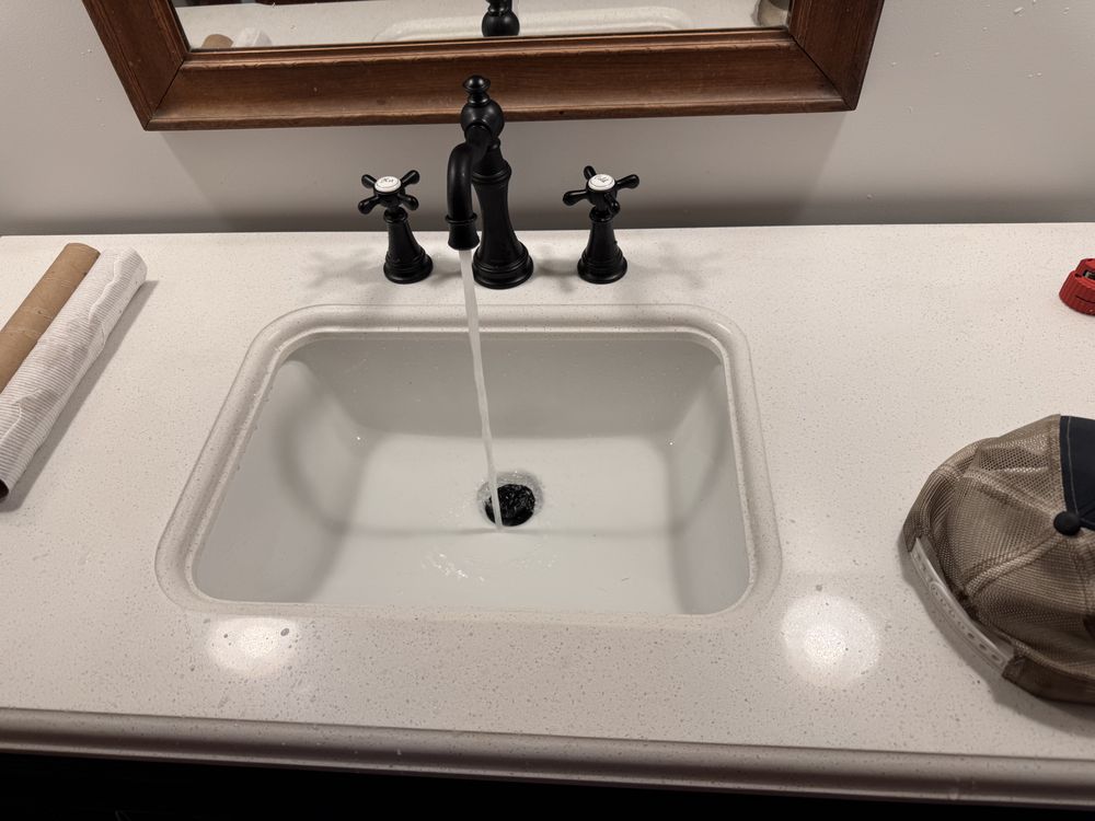 Slide of Mangan Plumbing Services