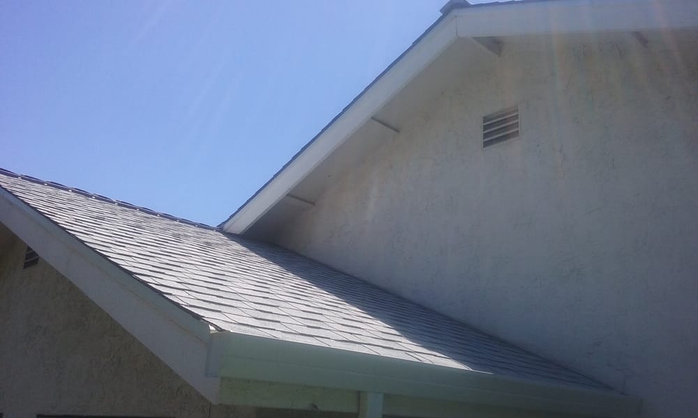 Slide of Simon Says Roofing