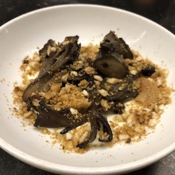 Wildair - Black maitake, stracciatella, chicken skin, tomatillo - New American Near Me - New York, New York Wildair - Black maitake, stracciatella, chicken skin, tomatillo - New American Near Me - New York, New York