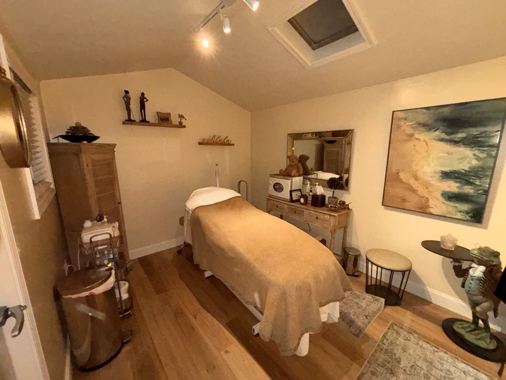 Amanda J's Waxing Studio Logo