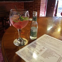 Castle Brasserie - Menu and gin specialty drink Pinkster with fresh raspberry and mint from their herb garden