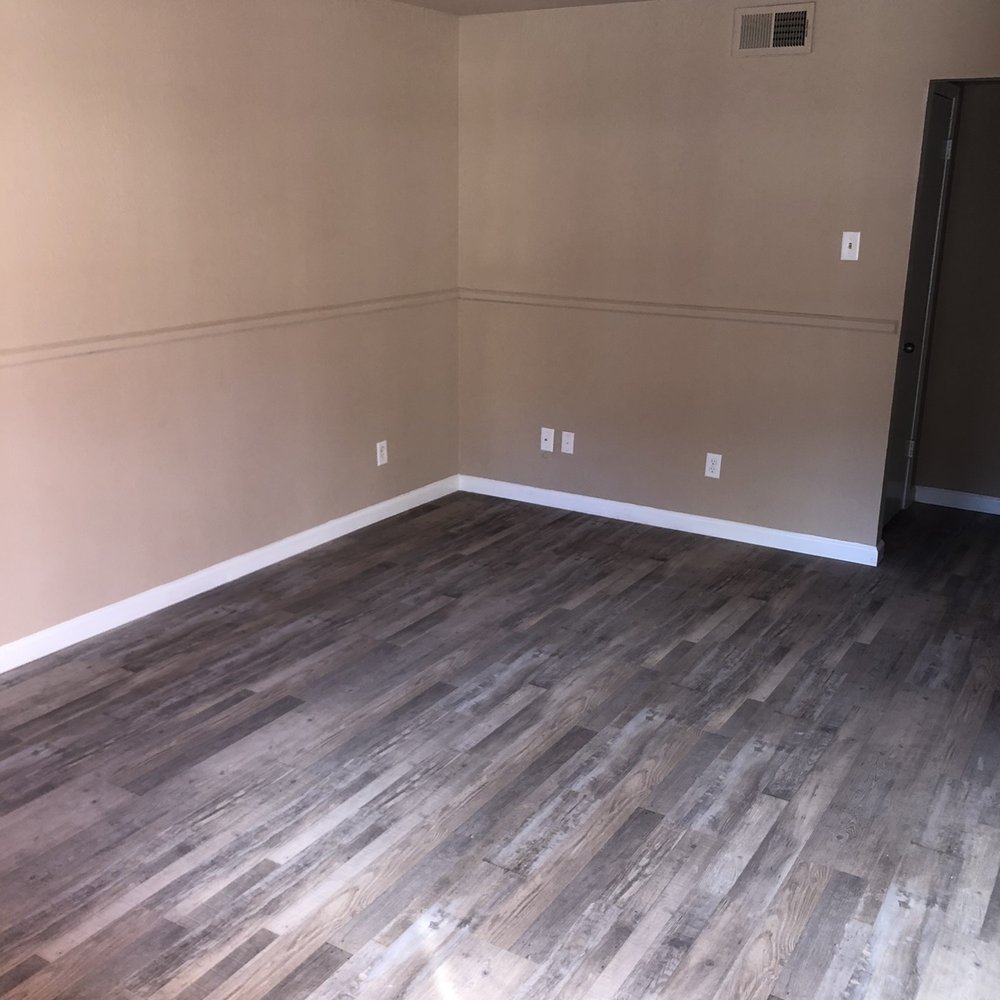 Colonial Apartments - Nice vinyl plank flooring - Apartments Near Me - Paris, Texas
