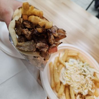 Gyro Gods - Pork gyro and feta fries - Greek Near Me - Westland, Michigan Gyro Gods - Pork gyro and feta fries - Greek Near Me - Westland, Michigan