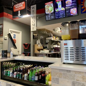 Chilakil - a view of a counter with drinks and beverages - Mexican Near Me - Naples, Florida Chilakil - a view of a counter with drinks and beverages - Mexican Near Me - Naples, Florida