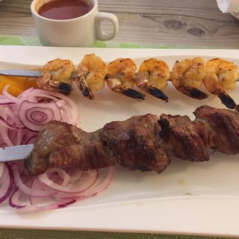Suzani Restaurant - Shrimp kabab overcooked and just meh.  Lamb kabab was 10x better and coupled with the red onion and red sauce was a hit! - Uzbek Near Me - Philadelphia, Pennsylvania